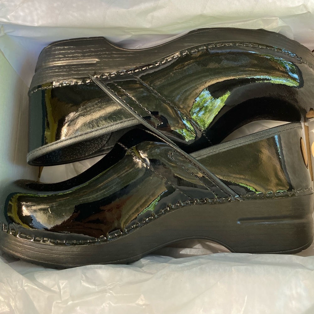 Dansko Professional Patent Black clogs.